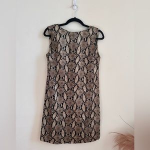 Snakeskin shift dress with light shoulder pads.